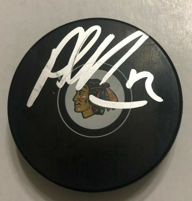 ALEX DEBRINCAT SIGNED CHICAGO BLACKHAWKS HOCKEY PUCK W/ CASE COA