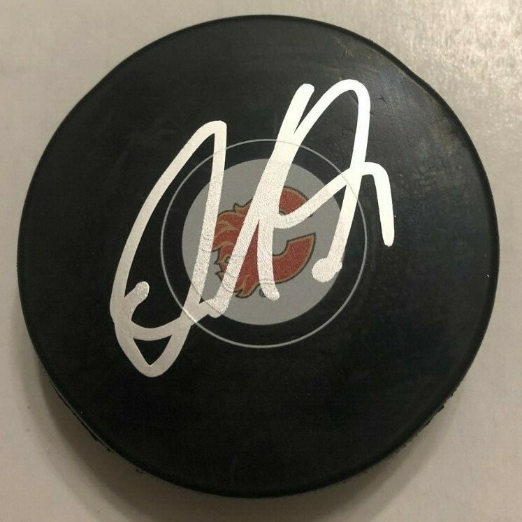 DILLON DUBE SIGNED CALGARY FLAMES HOCKEY PUCK W/ CASE COA