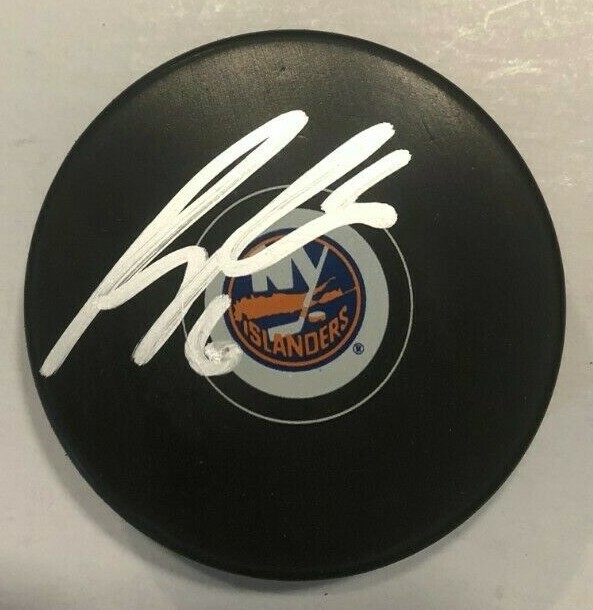 RYAN PULOCK SIGNED NEW YORK ISLANDERS HOCKEY PUCK W/ CASE COA