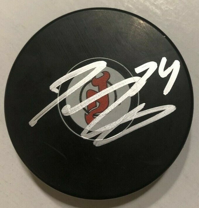 TY SMITH SIGNED NEW JERSEY DEVILS HOCKEY PUCK W/ CASE COA