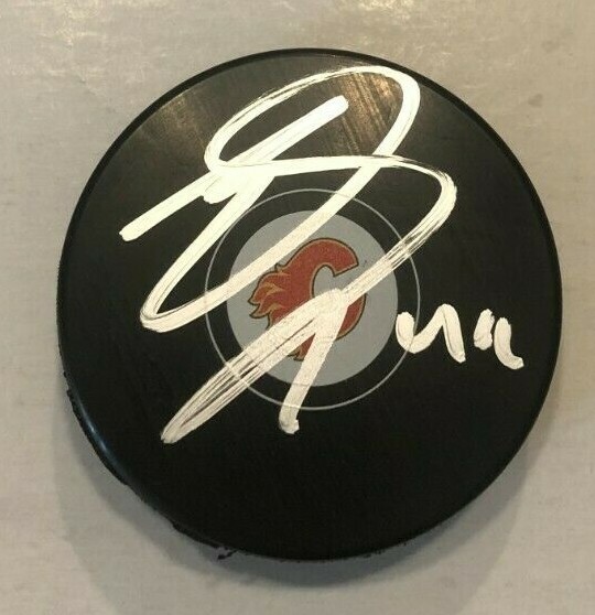 ERIK GUDBRANSON SIGNED CALGARY FLAMES HOCKEY PUCK W/ CASE COA