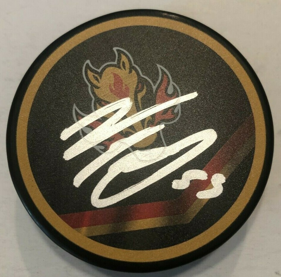 NOAH HANIFIN SIGNED CALGARY FLAMES HOCKEY PUCK W/ CASE COA