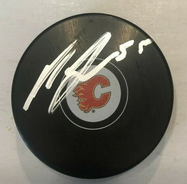 NOAH HANIFIN SIGNED CALGARY FLAMES HOCKEY PUCK W/ CASE COA