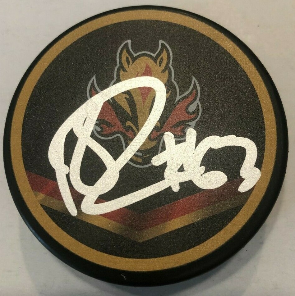 ADAM RUZICKA SIGNED CALGARY FLAMES HOCKEY PUCK W/ CASE COA