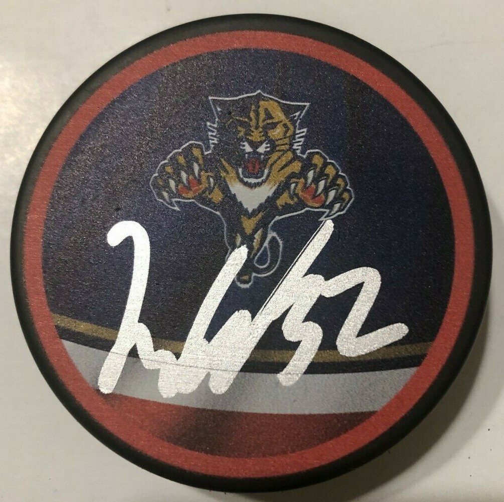LUCAS CARLSSON SIGNED FLORIDA PANTHERS HOCKEY PUCK W/ CASE COA