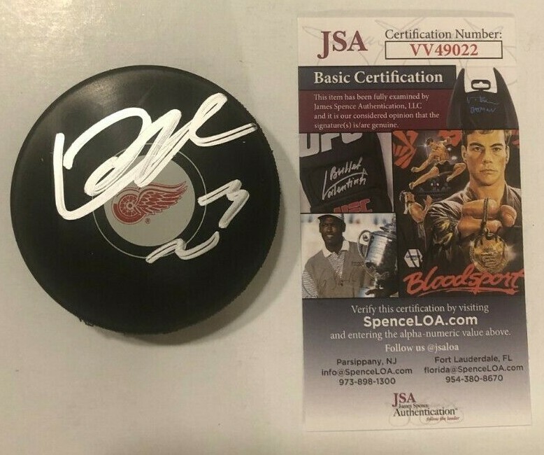 LUCAS RAYMOND SIGNED DETROIT RED WINGS HOCKEY PUCK W CASE JSA COA