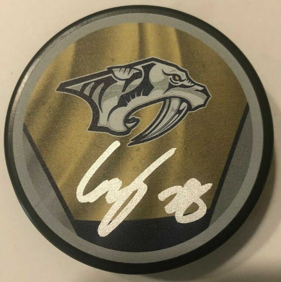 EELI TOLVANEN SIGNED NASHVILLE PREDATORS HOCKEY PUCK W/ CASE COA