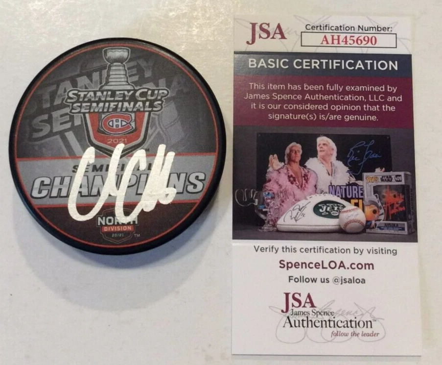 COLE CAUFIELD SIGNED MONTREAL CANADIENS 2022 NORTH CHAMPIONS PUCK W CASE JSA COA