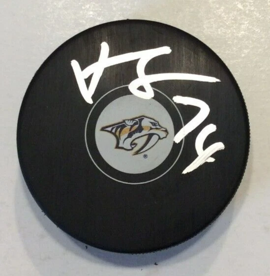 JUUSE SAROS SIGNED NASHVILLE PREDATORS HOCKEY PUCK W/ CASE COA