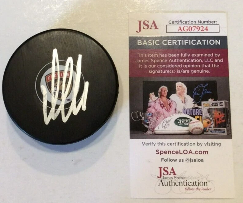 ALEKSANDER BARKOV SIGNED FLORIDA PANTHERS HOCKEY PUCK W/ CASE JSA COA
