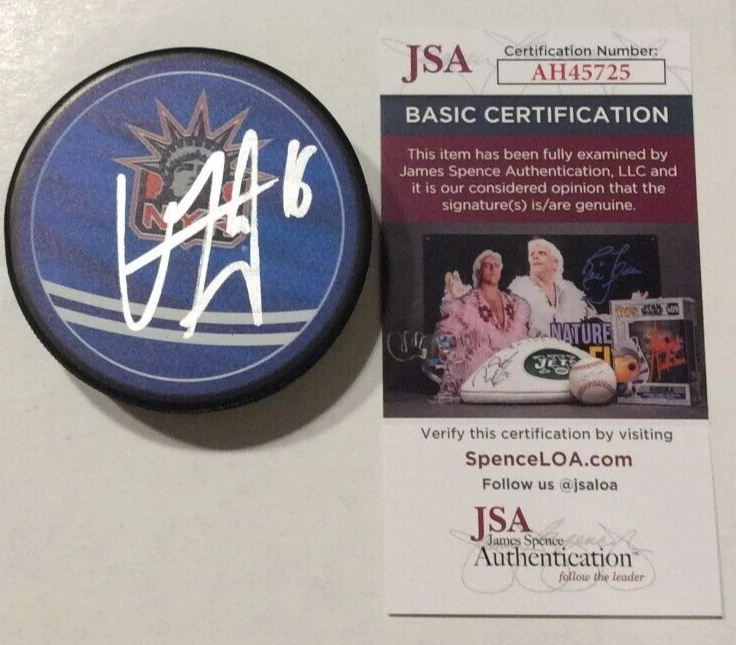 VINCENT TROCHECK SIGNED NEW YORK RANGERS HOCKEY PUCK W/ CASE JSA COA