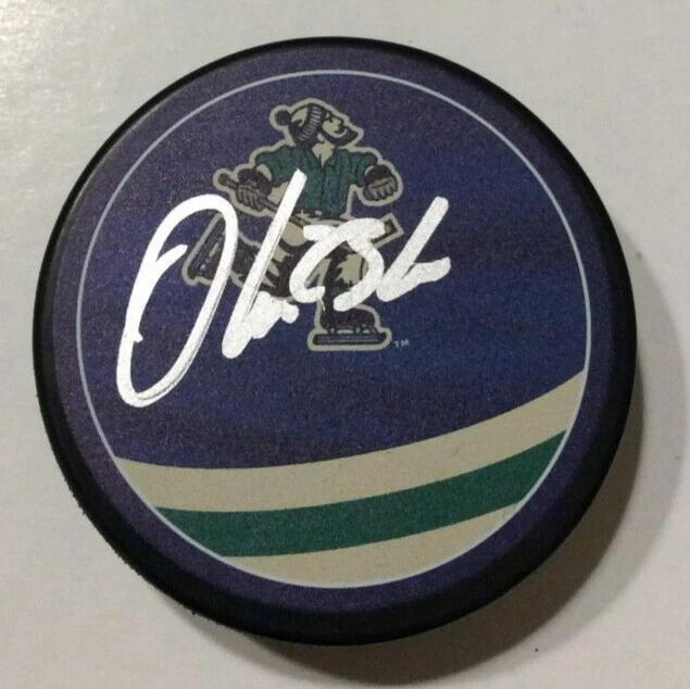 OLIVER EKMAN-LARSSON SIGNED VANCOUVER CANUCKS REVERSE RETRO PUCK W/ CASE COA