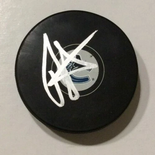 TYLER MYERS  SIGNED VANCOUVER CANUCKS HOCKEY PUCK W/ CASE COA