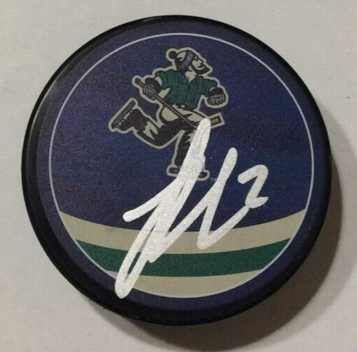 LUKE SCHENN SIGNED VANCOUVER CANUCKS REVERSE RETRO HOCKEY PUCK W/ CASE COA