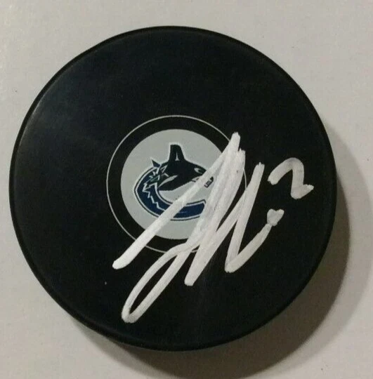 LUKE SCHENN SIGNED VANCOUVER CANUCKS HOCKEY PUCK W/ CASE COA