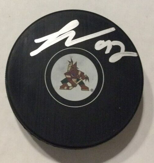 LOGAN COOLEY SIGNED ARIZONA COYOTES HOCKEY PUCK W/ CASE COA