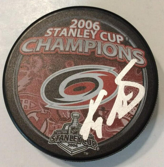 KEVYN ADAMS SIGNED CAROLINA HURRICANES 2006 STANLEY CUP PUCK W/ CASE COA