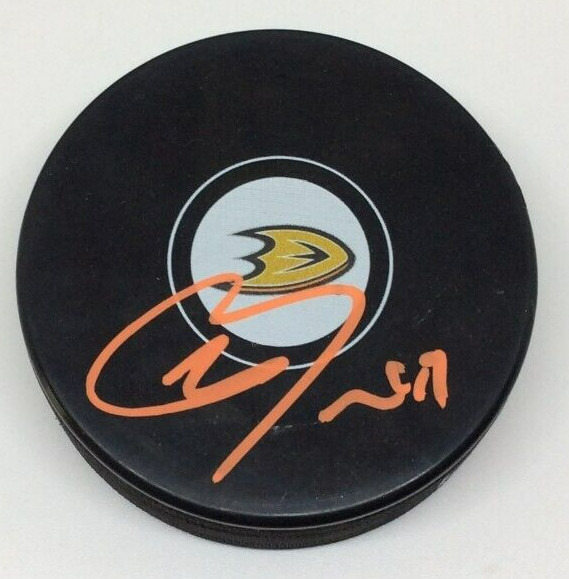 MAX JONES SIGNED ANAHEIM DUCKS HOCKEY PUCK W/ CASE COA