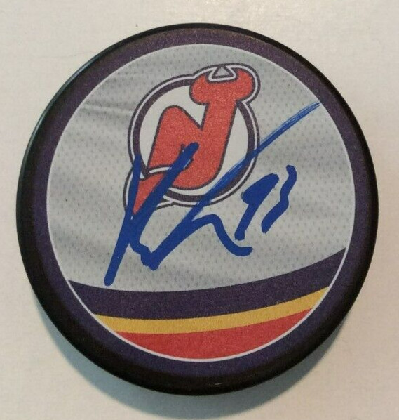 RYAN GRAVES SIGNED NEW JERSEY DEVILS HOCKEY PUCK W/ CASE COA