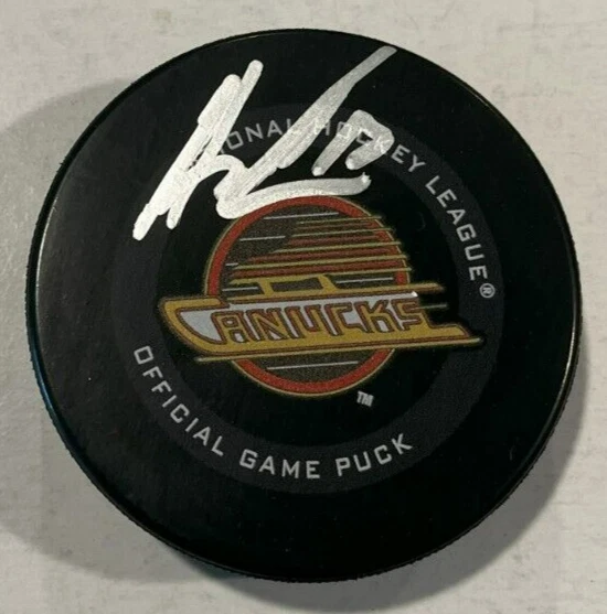 FILIP HRONEK SIGNED VANCOUVER CANUCKS GAME HOCKEY PUCK W/ CASE COA