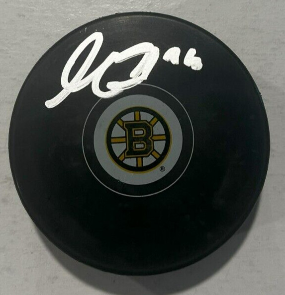 MATT GRZELCYK SIGNED BOSTON BRUINS HOCKEY PUCK W/ CASE COA