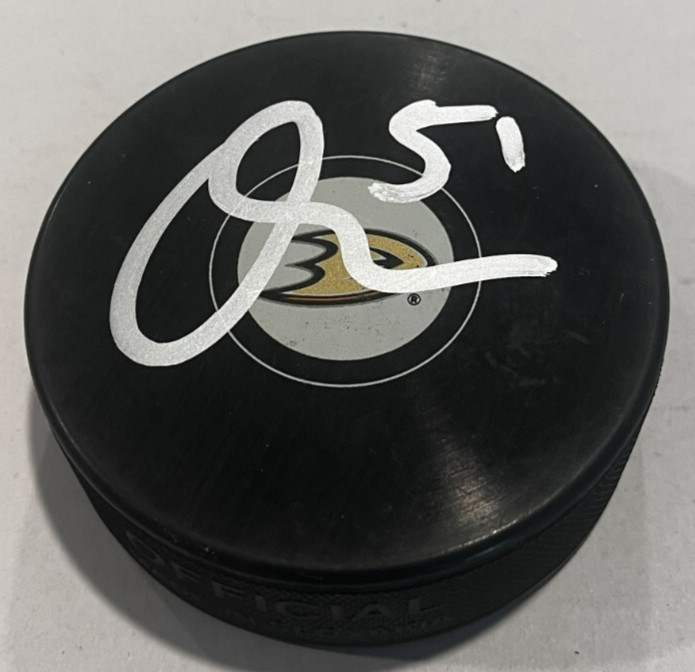 OLEN ZELLWEGER SIGNED ANAHEIM DUCKS HOCKEY PUCK W/ CASE COA