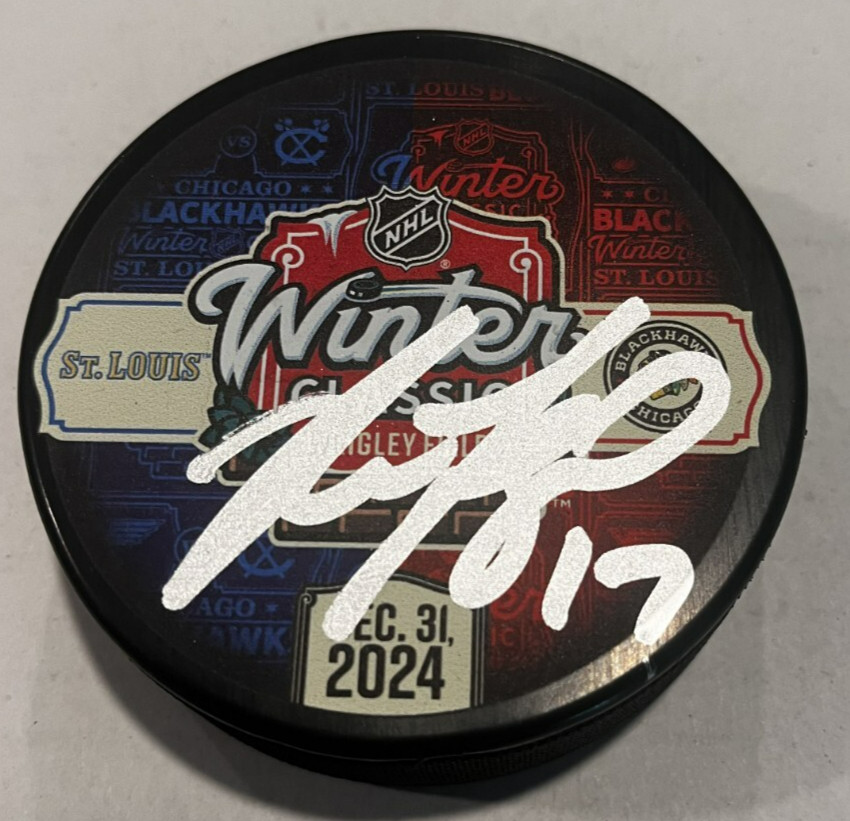 NICK FOLIGNO SIGNED CHICAGO BLACKHAWKS 2024 WINTER CLASSIC PUCK W/ CASE COA