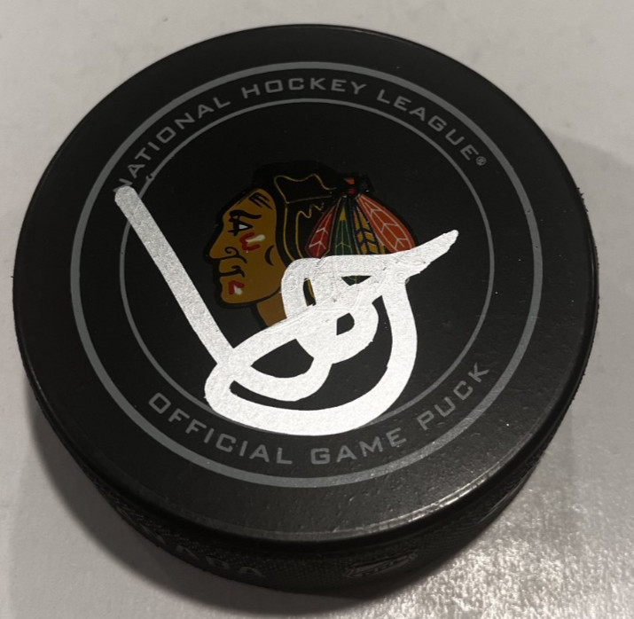 ARTYOM LEVSHUNOV SIGNED CHICAGO BLACKHAWKS OFFICIAL GAME HOCKEY PUCK W/ CASE COA