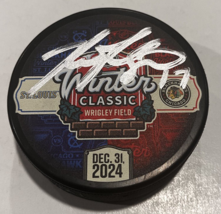 NICK FOLIGNO SIGNED CHICAGO BLACKHAWKS 2024 WINTER CLASSIC PUCK W/ CASE COA