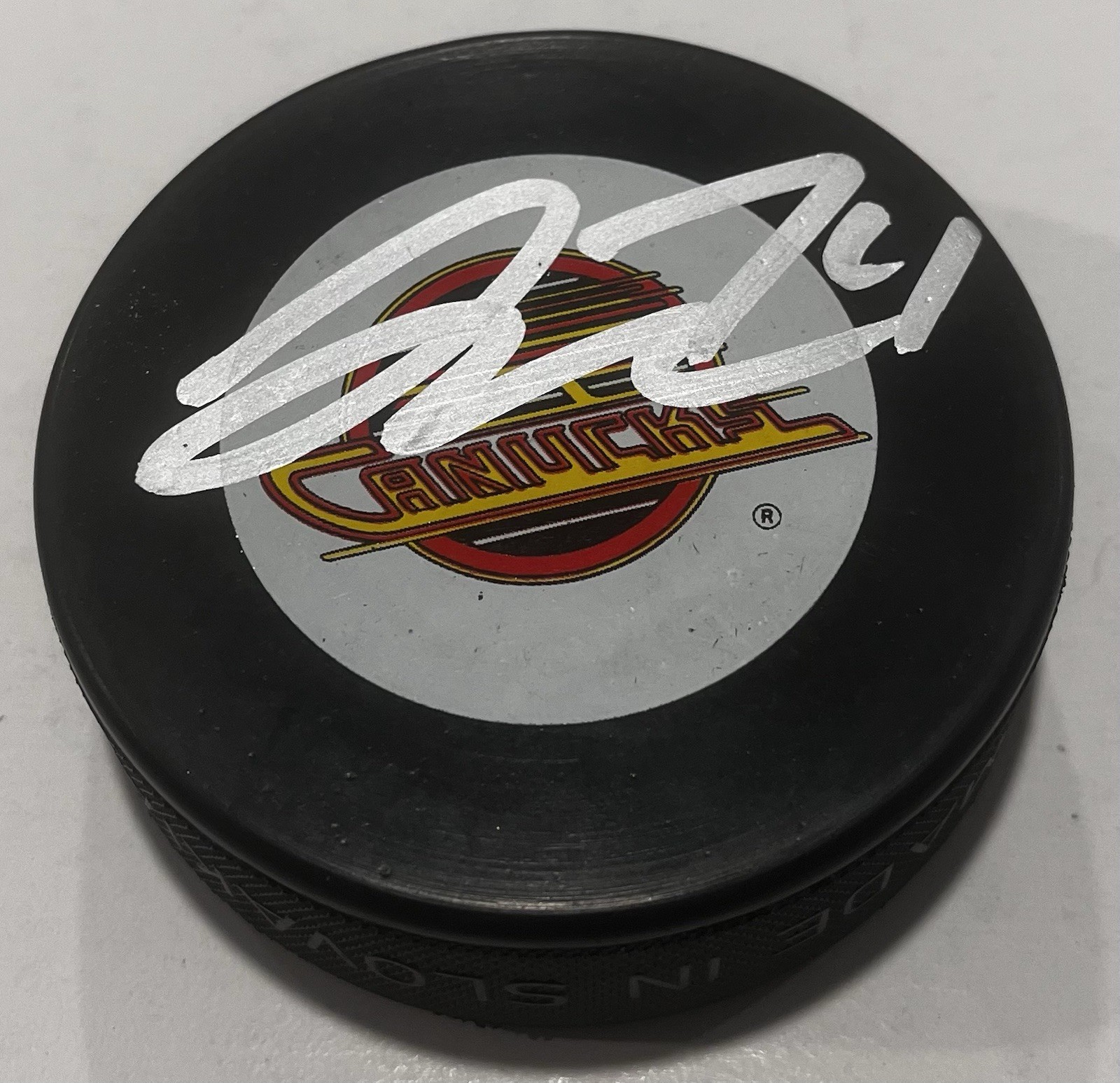 JAKE DEBRUSK SIGNED VANCOUVER CANUCKS HOCKEY PUCK W/ CASE COA