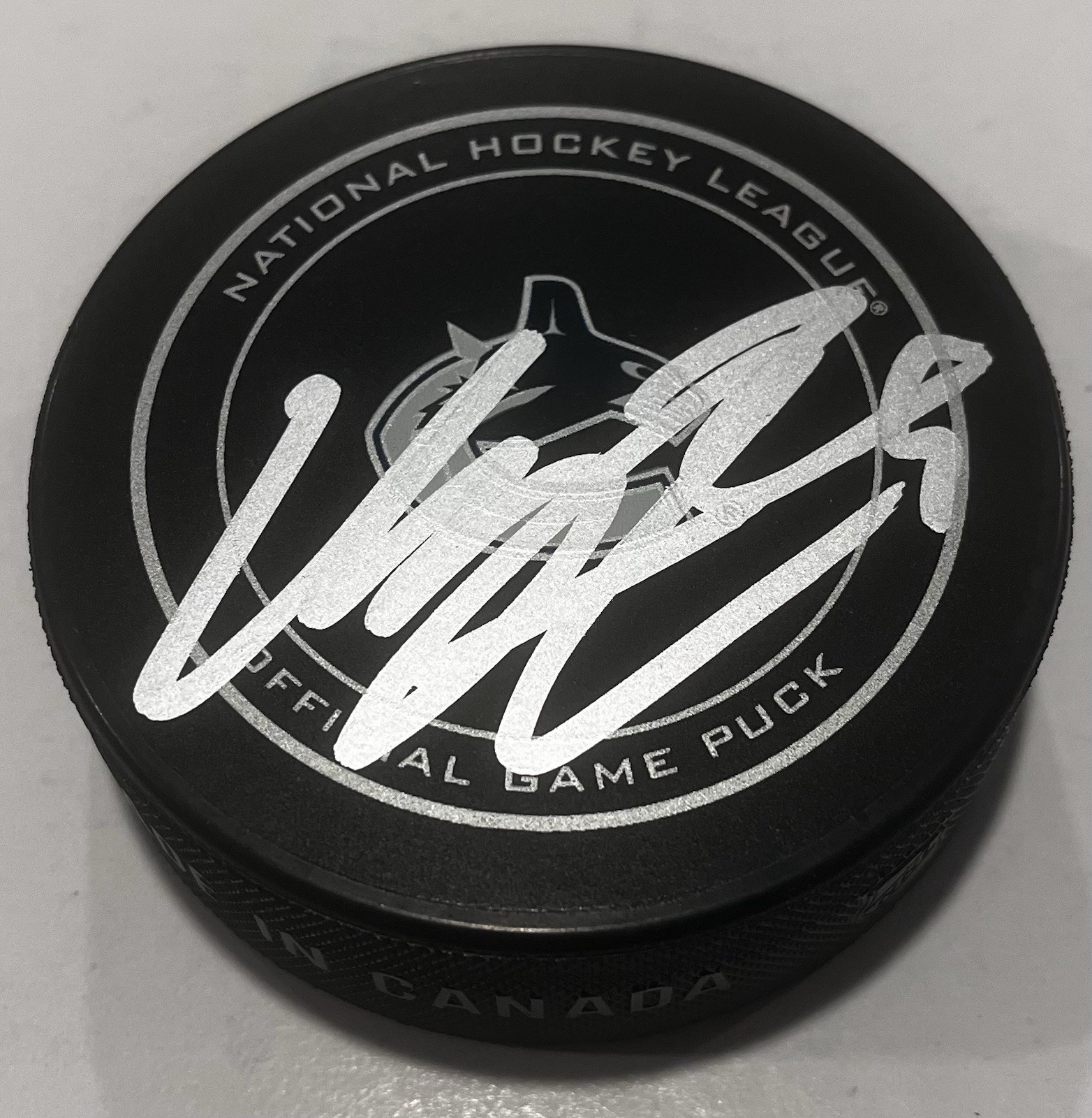 MARCUS PETTERSSON SIGNED VANCOUVER CANUCKS GAME HOCKEY PUCK W/ CASE COA