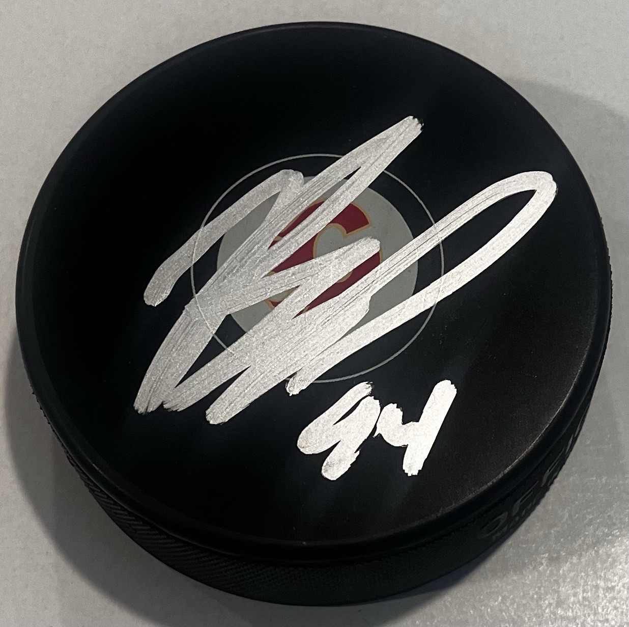 BRAYDEN PACHAL SIGNED CALGARY FLAMES HOCKEY PUCK W/ CASE COA