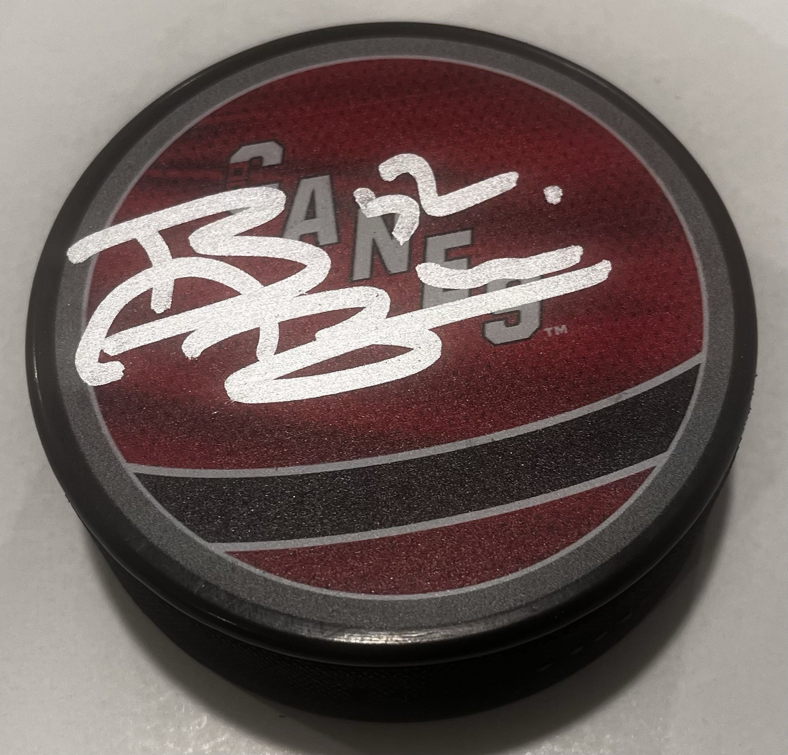 BRANDON BUSSI SIGNED CAROLINA HURRICANES HOCKEY PUCK W/ CASE COA
