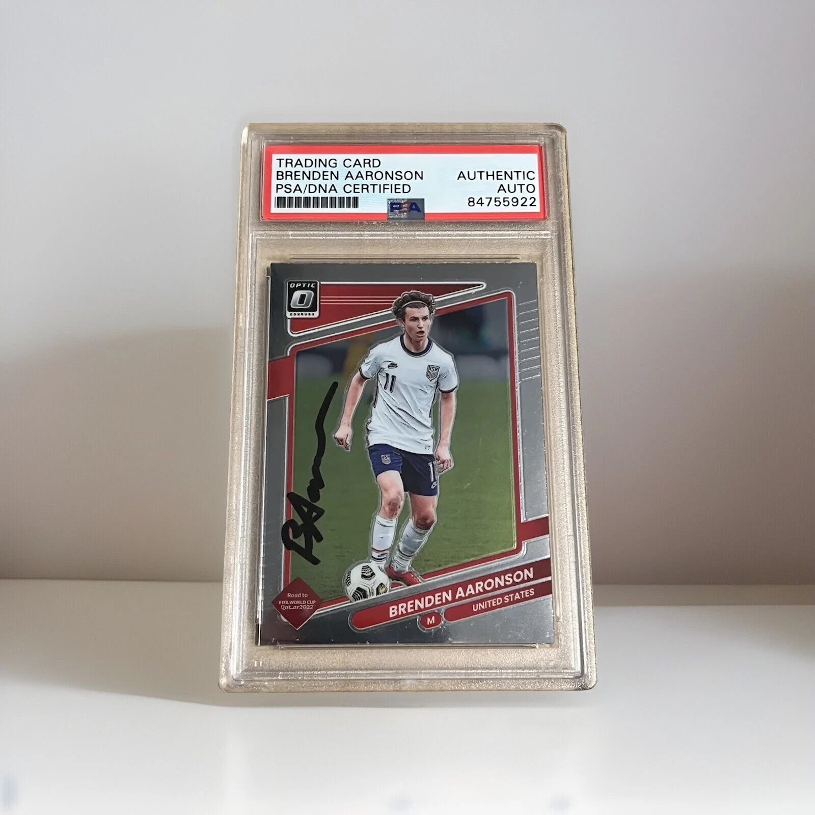 Brenden Aaronson SIGNED AUTO 2021-22 Panini Donruss Optic WC #165 USMNT PSA/DNA