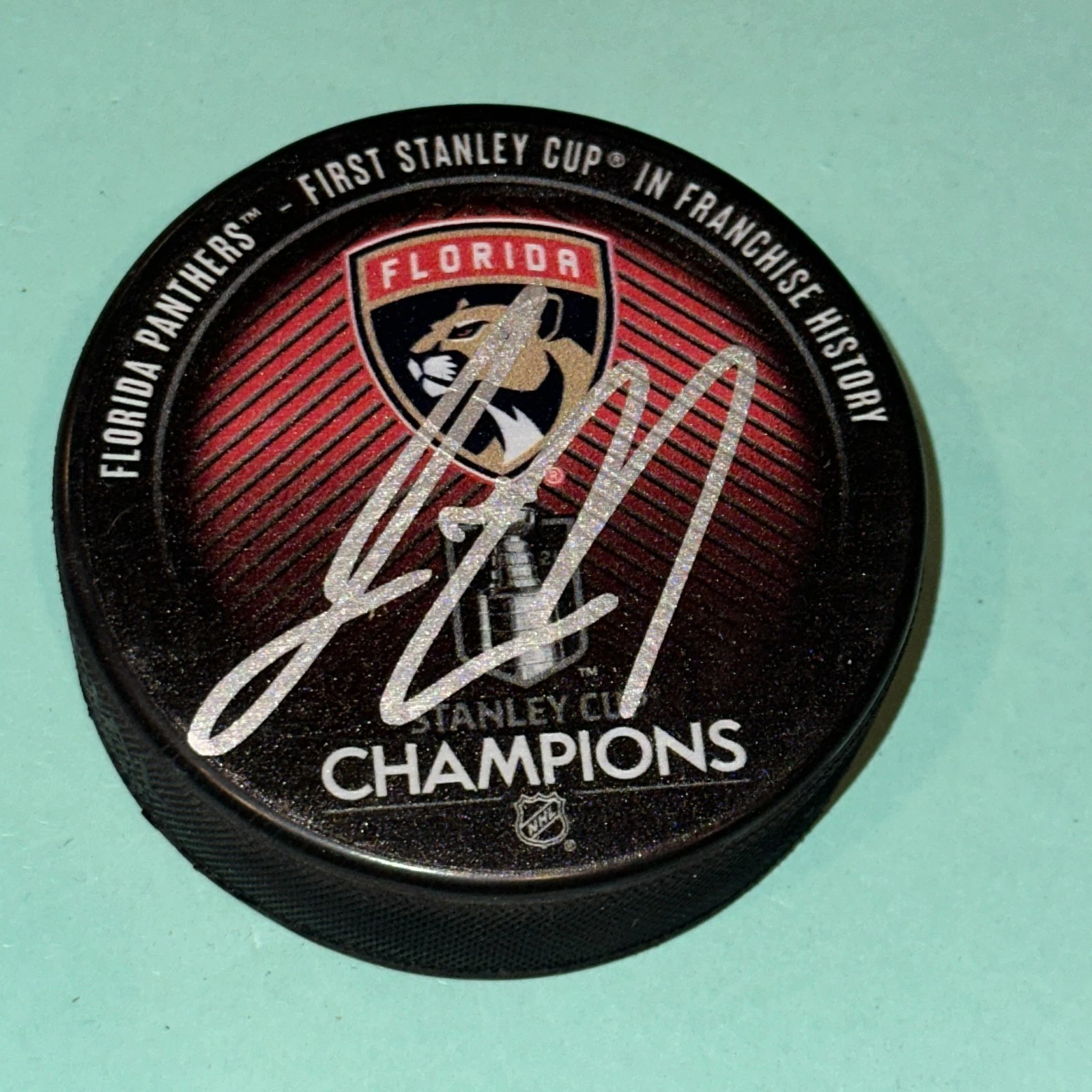 JOSH MAHURA Signed Panthers 2024 STANLEY CUP CHAMPS Puck Beckett (BAS)