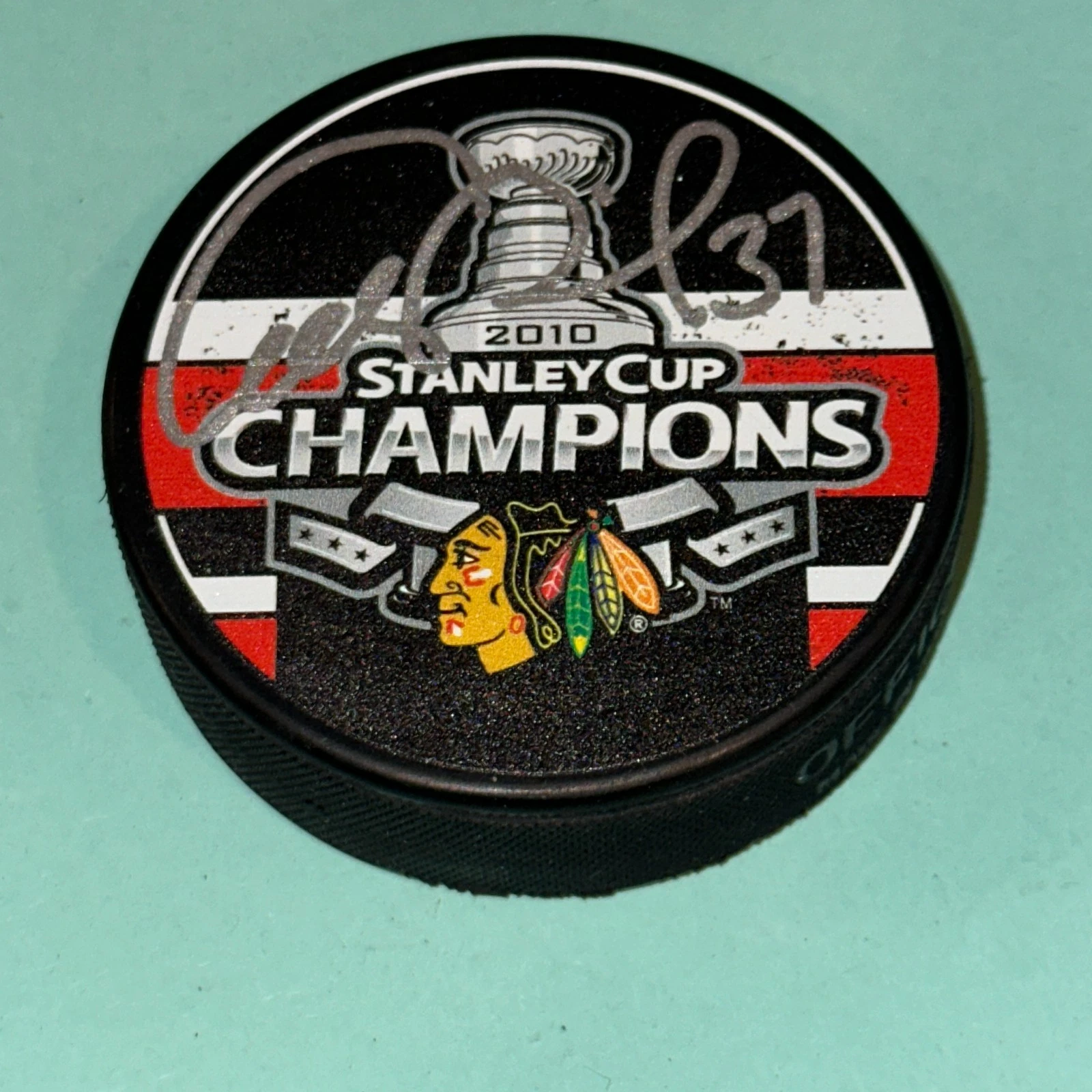 ADAM BURISH Signed BLACKHAWKS 2010 STANLEY CUP CHAMPS Puck Beckett (BAS)