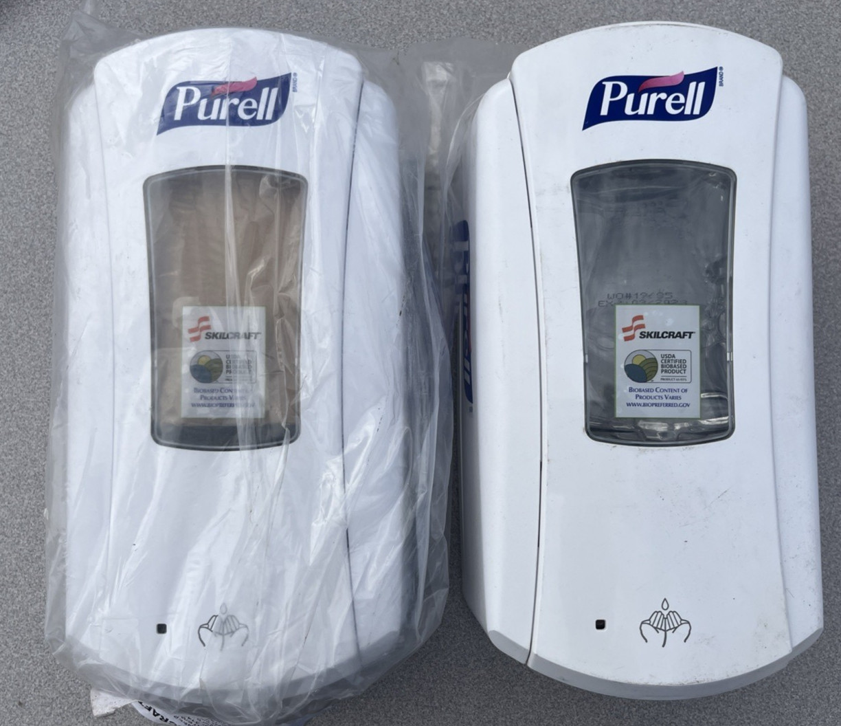 2 Purell Hand Sanitizer Dispenser Wall Mount ONE New in Plastic Both W Sanitizer