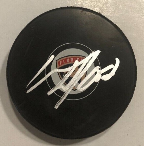 MACKENZIE WEEGAR SIGNED FLORIDA PANTHERS HOCKEY PUCK W/ CASE COA