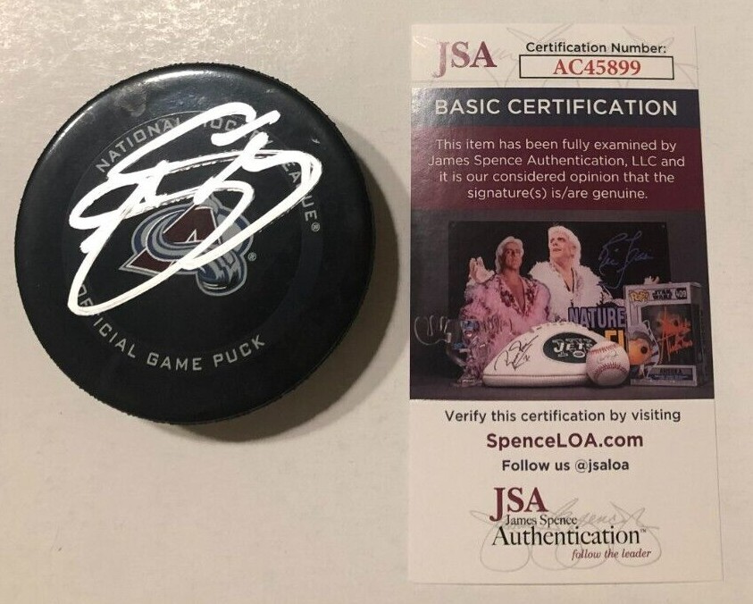 JOE SAKIC SIGNED COLORADO AVALANCHE OFFICIAL GAME HOCKEY PUCK W/ CASE JSA COA