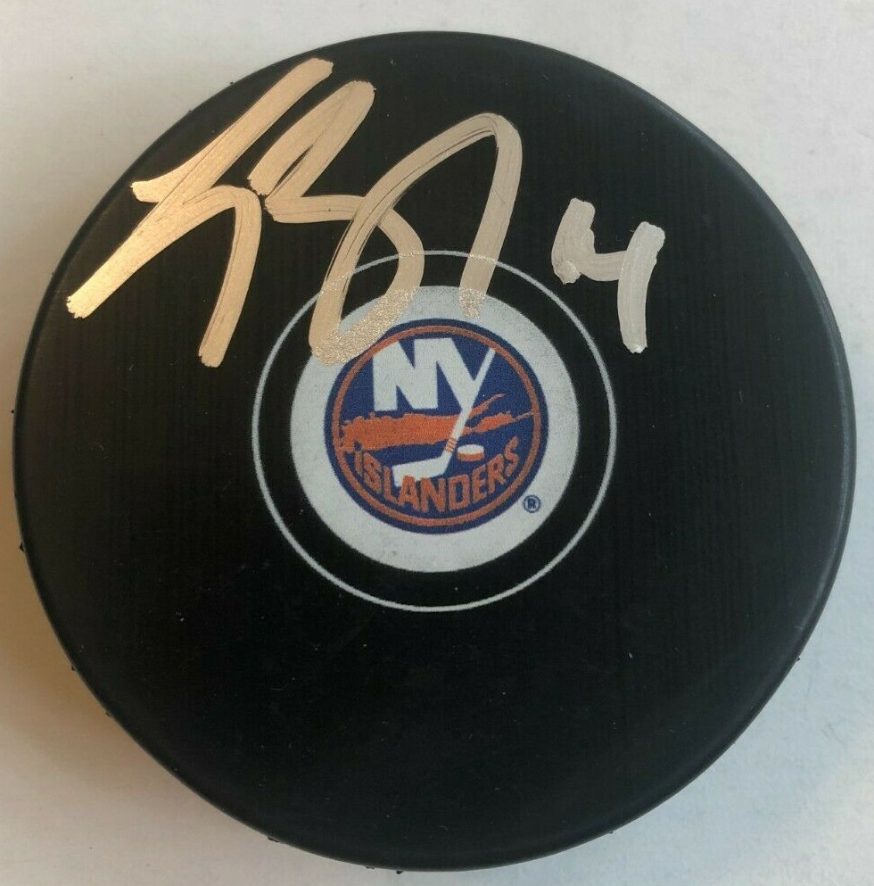 TRAVIS ZAJAC SIGNED NEW YORK ISLANDERS HOCKEY PUCK W/ CASE COA