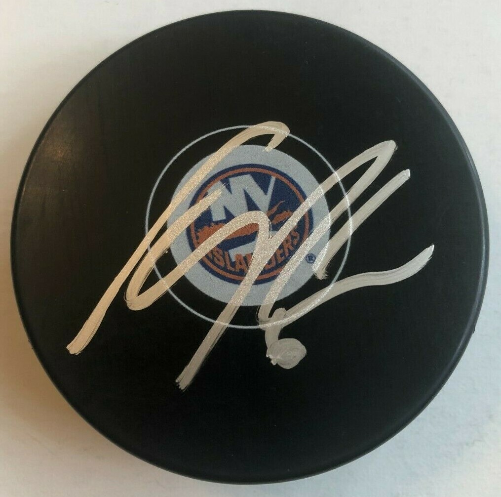 RYAN PULOCK SIGNED NEW YORK ISLANDERS HOCKEY PUCK W/ CASE COA
