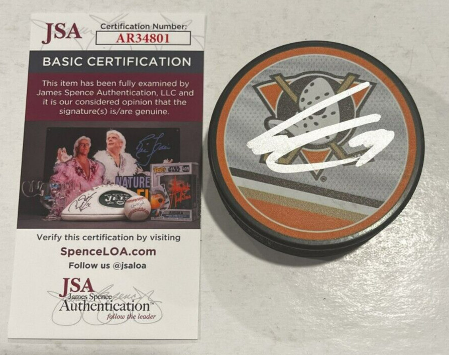LEO CARLSSON SIGNED ANAHEIM DUCKS HOCKEY PUCK W/ CASE JSA COA