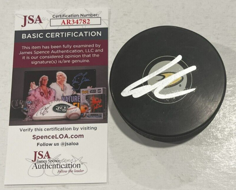 LEO CARLSSON SIGNED ANAHEIM DUCKS HOCKEY PUCK W/ CASE JSA COA