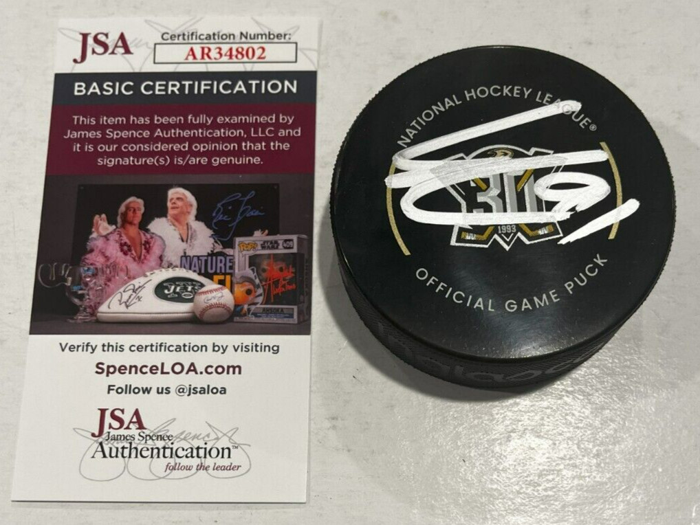 LEO CARLSSON SIGNED ANAHEIM DUCKS OFFICIAL GAME HOCKEY PUCK W/ CASE JSA COA