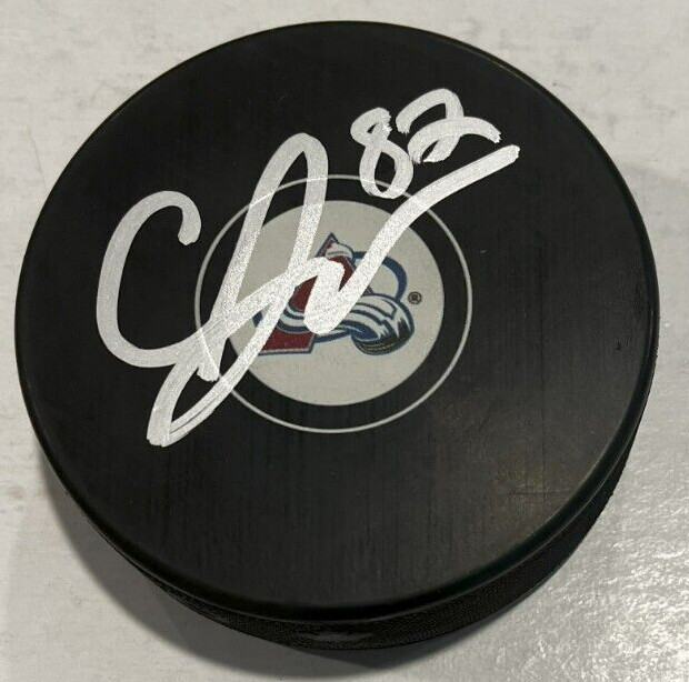 CALEB JONES SIGNED COLORADO AVALANCHE HOCKEY PUCK W/ CASE COA