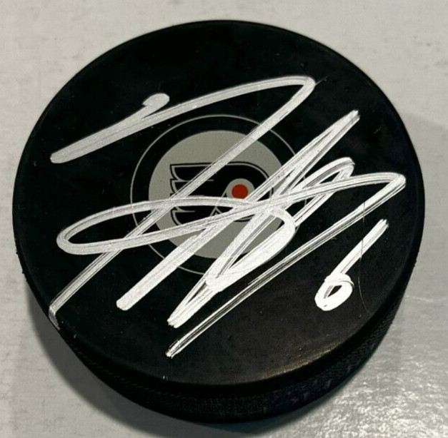 TRAVIS SANHEIM SIGNED PHILADELPHIA FLYERS HOCKEY PUCK W/ CASE COA