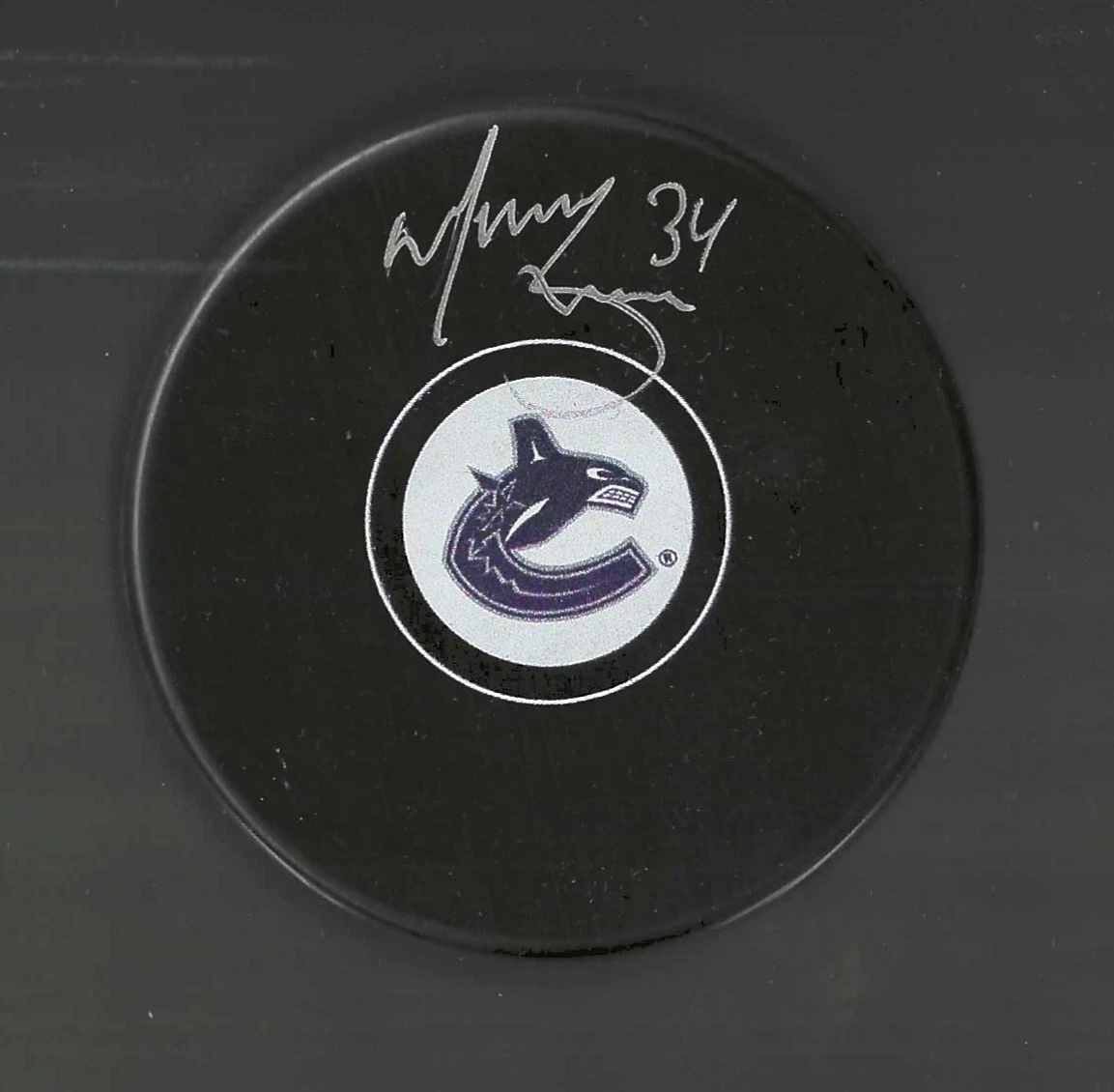 Manny Legace Signed Vancuver Canucks Puck