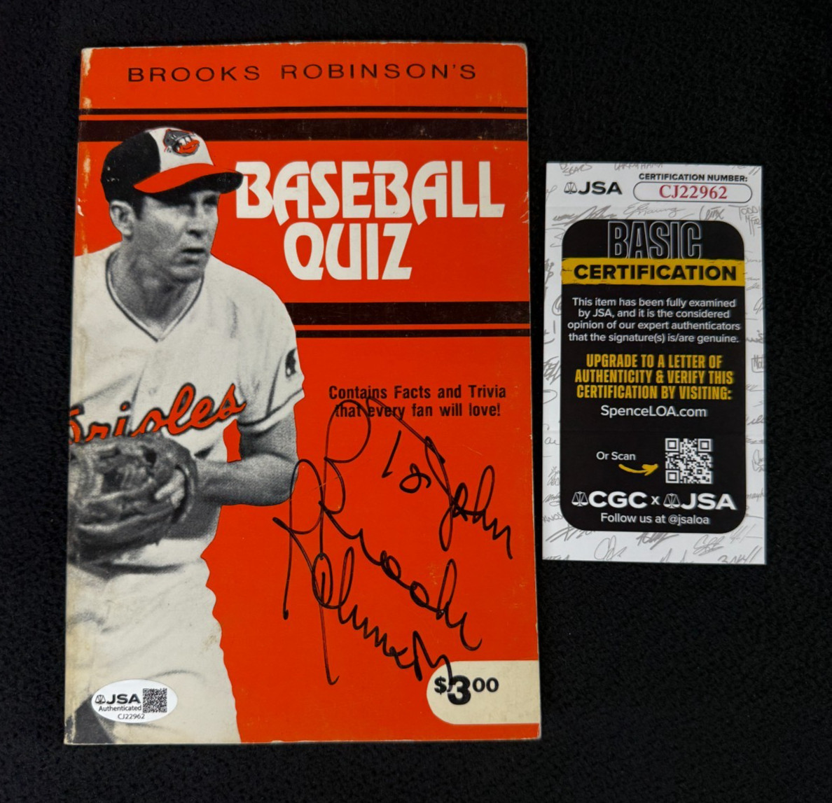 Brooks Robinson Signed Balitmore Orioles Quiz Book Personalized To John JSA COA