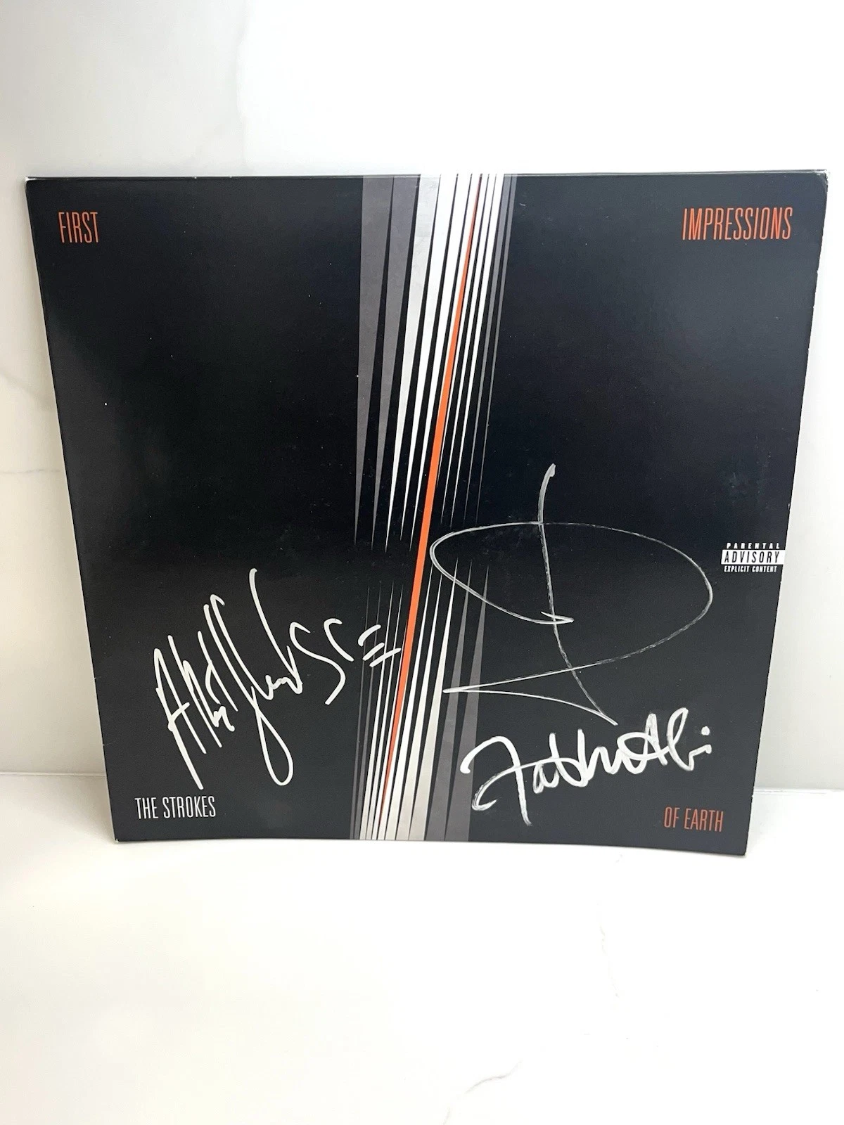 THE STROKES BAND SIGNED 'FIRST IMPRESSIONS' VINYL RECORD BECKETT CERT