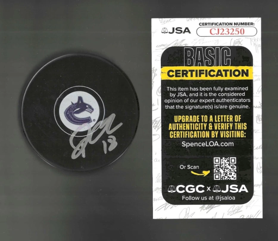 Drew O'Connor Signed Vancouver Canucks Puck JSA COA